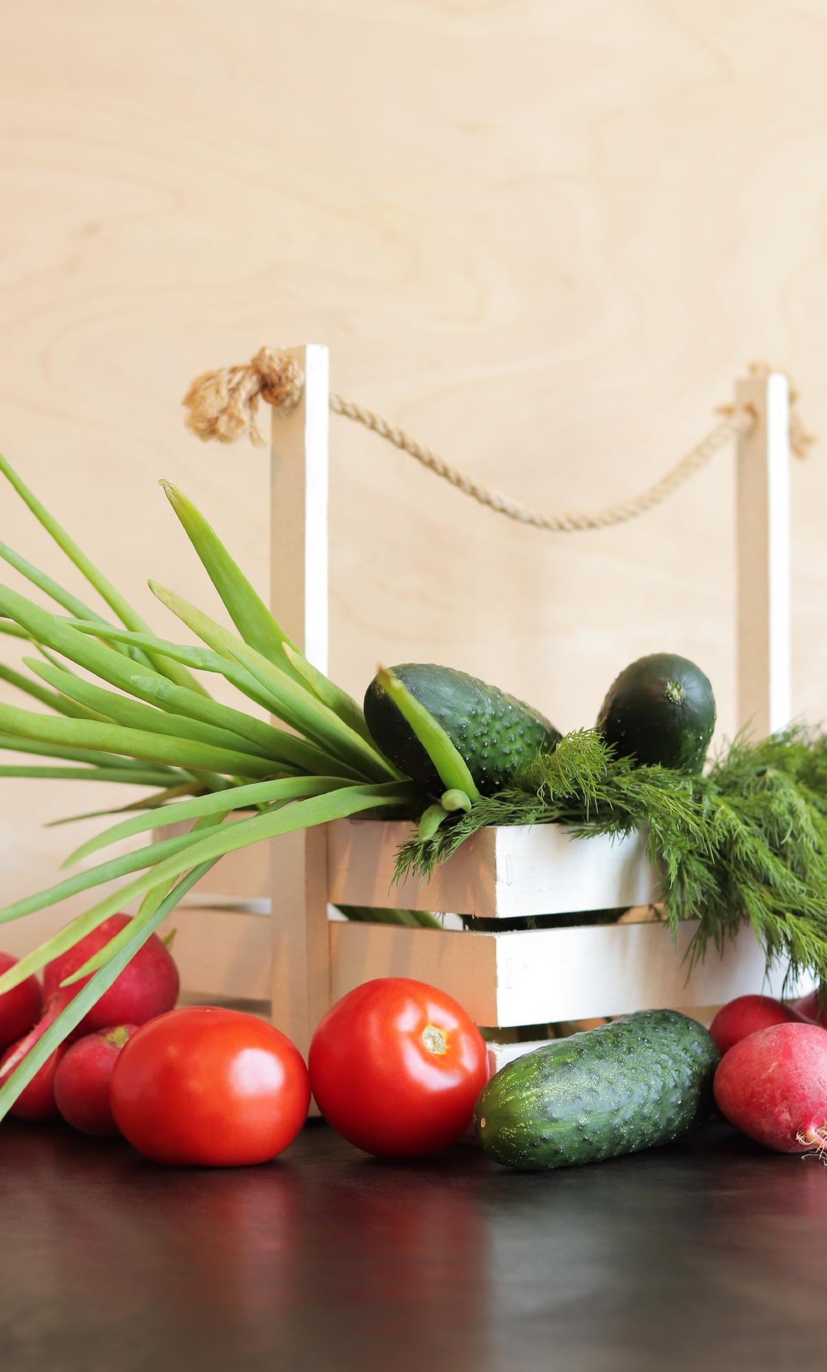Studio kitchen counter with fresh produce and utensils